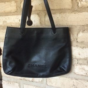 Women’s black Chanel handbag……